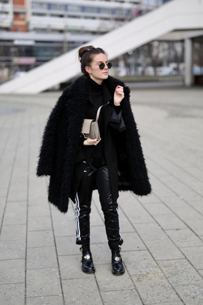 teddy coat, black sweater, black joggers adidas, leather boots
